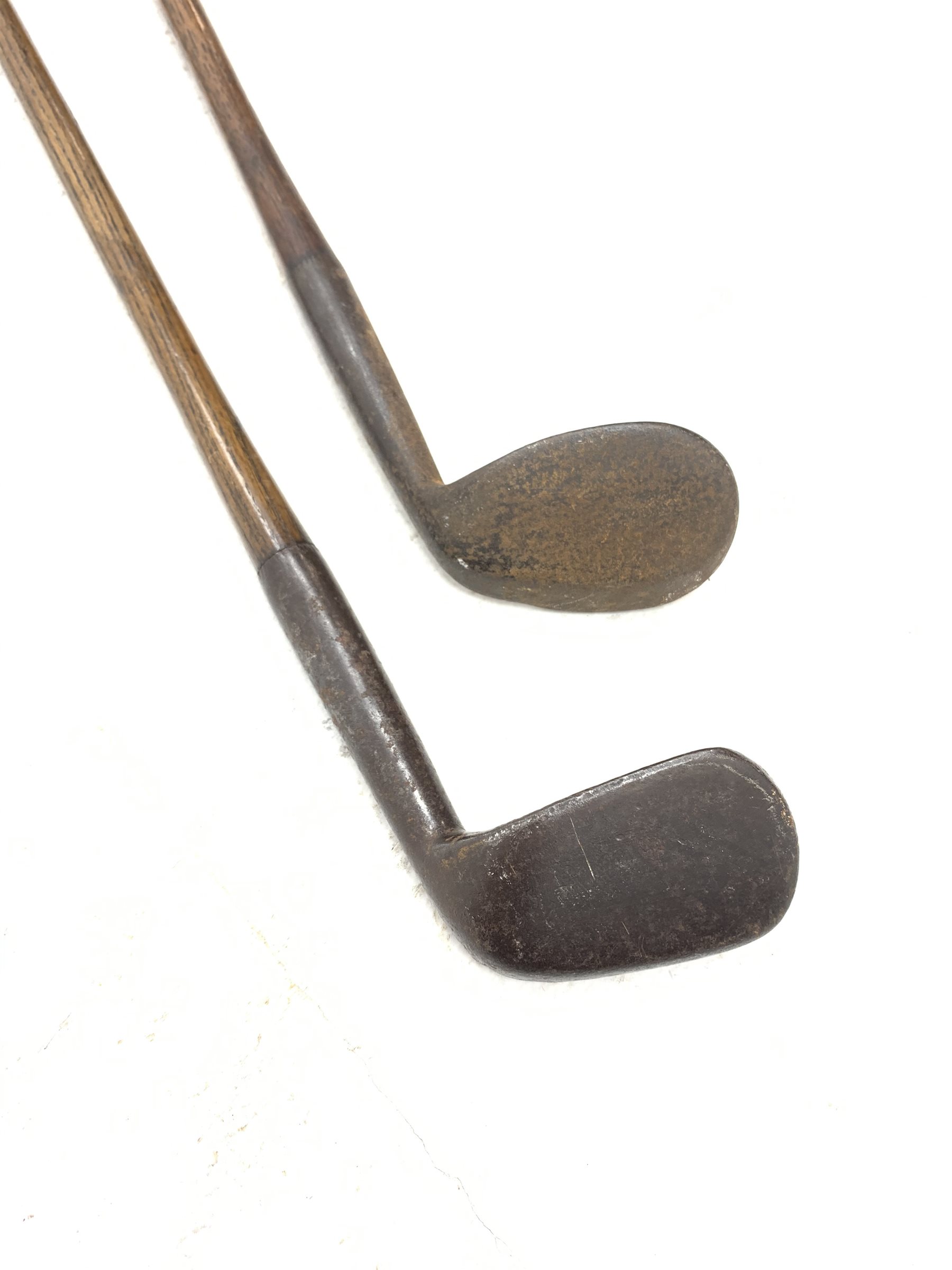 Golf 19th century rut or track type iron with head indistinctly marked NIBLICK, hickory shaft