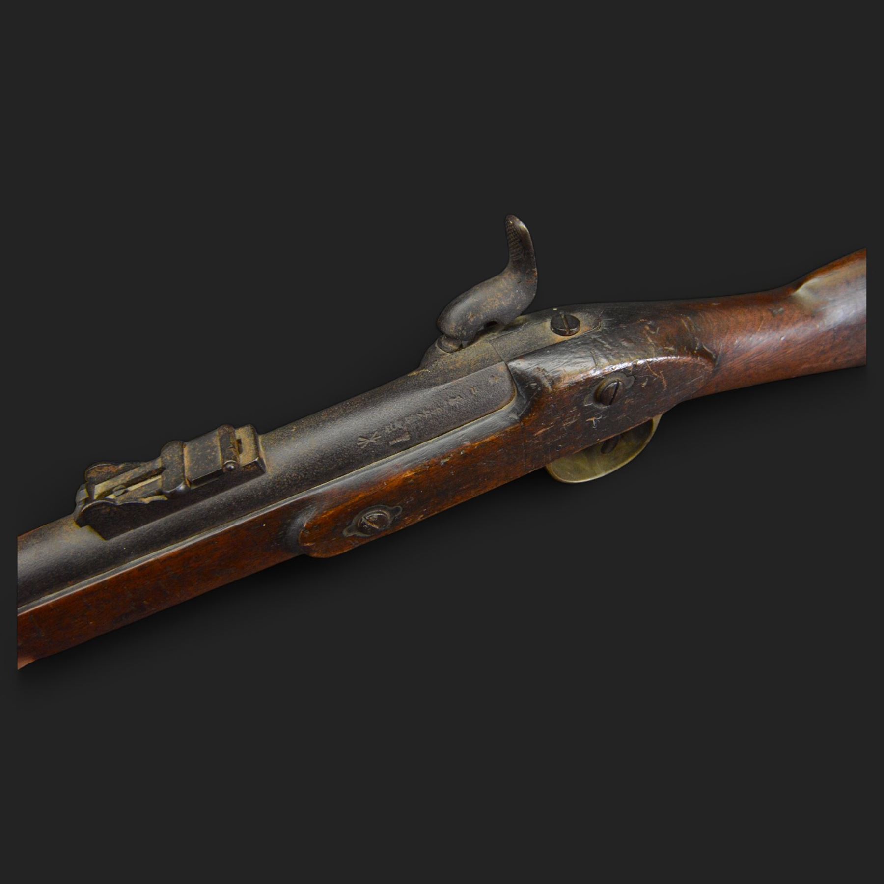 Two-Band short service musket, the L66cm barrel with sold out of service marks and indistinct marks, with ram rod beneath, the lock marked with crowned and Windsor 1855, overall L108cm
Sold as an exempt item under Section 58 (2) of the 1968 Firearms Act, to be held as a curiosity or ornament