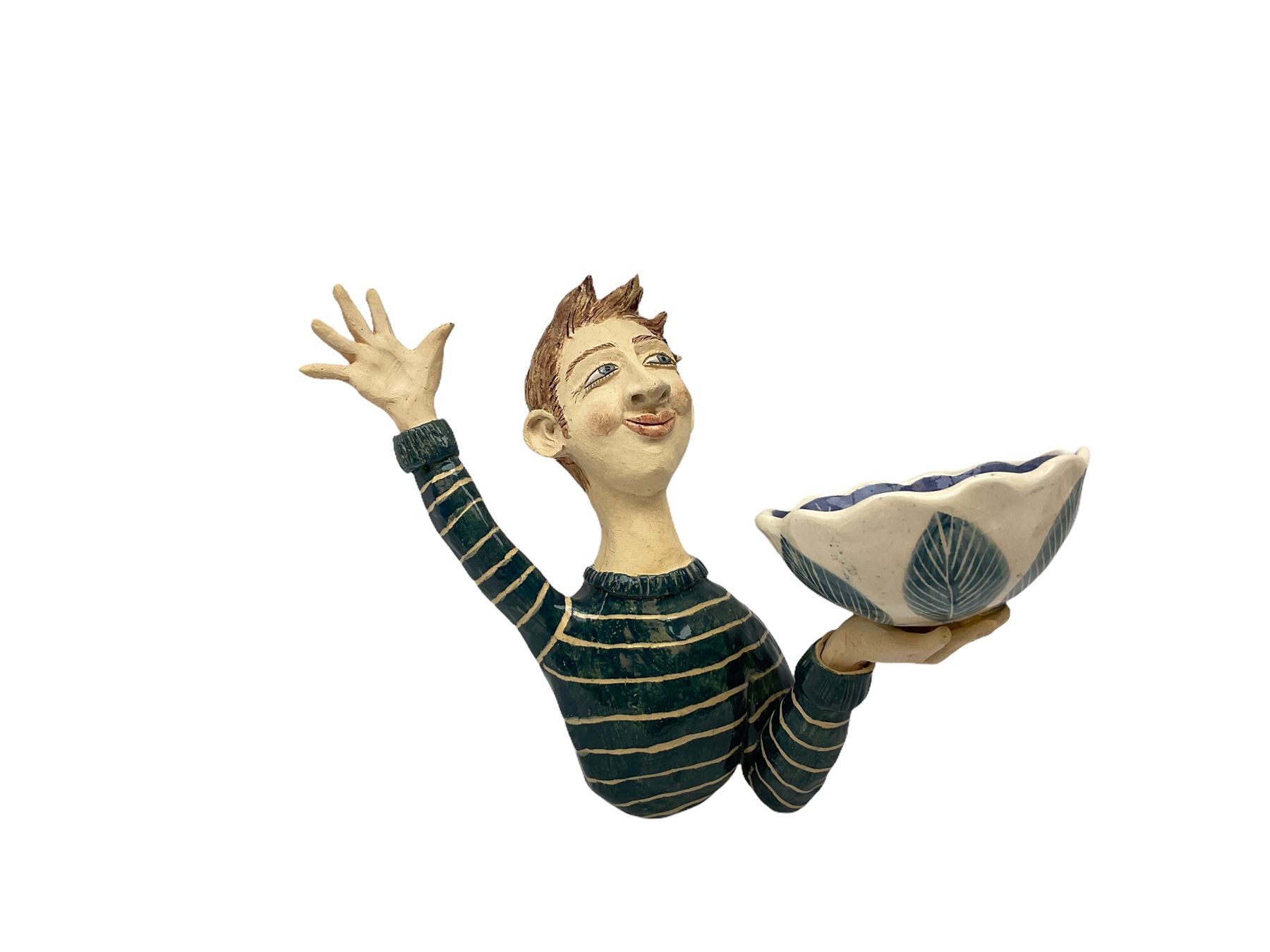 Ceramic 'girl and boy dish', by Helen Kemp, an oval dish with a mottled pink ground and gilt edging upon the sculpted heads of a girl and a boy, together with a 'boy sconce', by Helen Kemp, a sculpted boy holding a small bowl with foliate decoration, both with the artist's mark beneath.