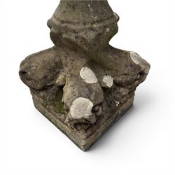 19th century weathered sandstone birdbath, the octagonal canted dished top raised on a ring turned flared pedestal, with four carved stylised dolphins to the squared base