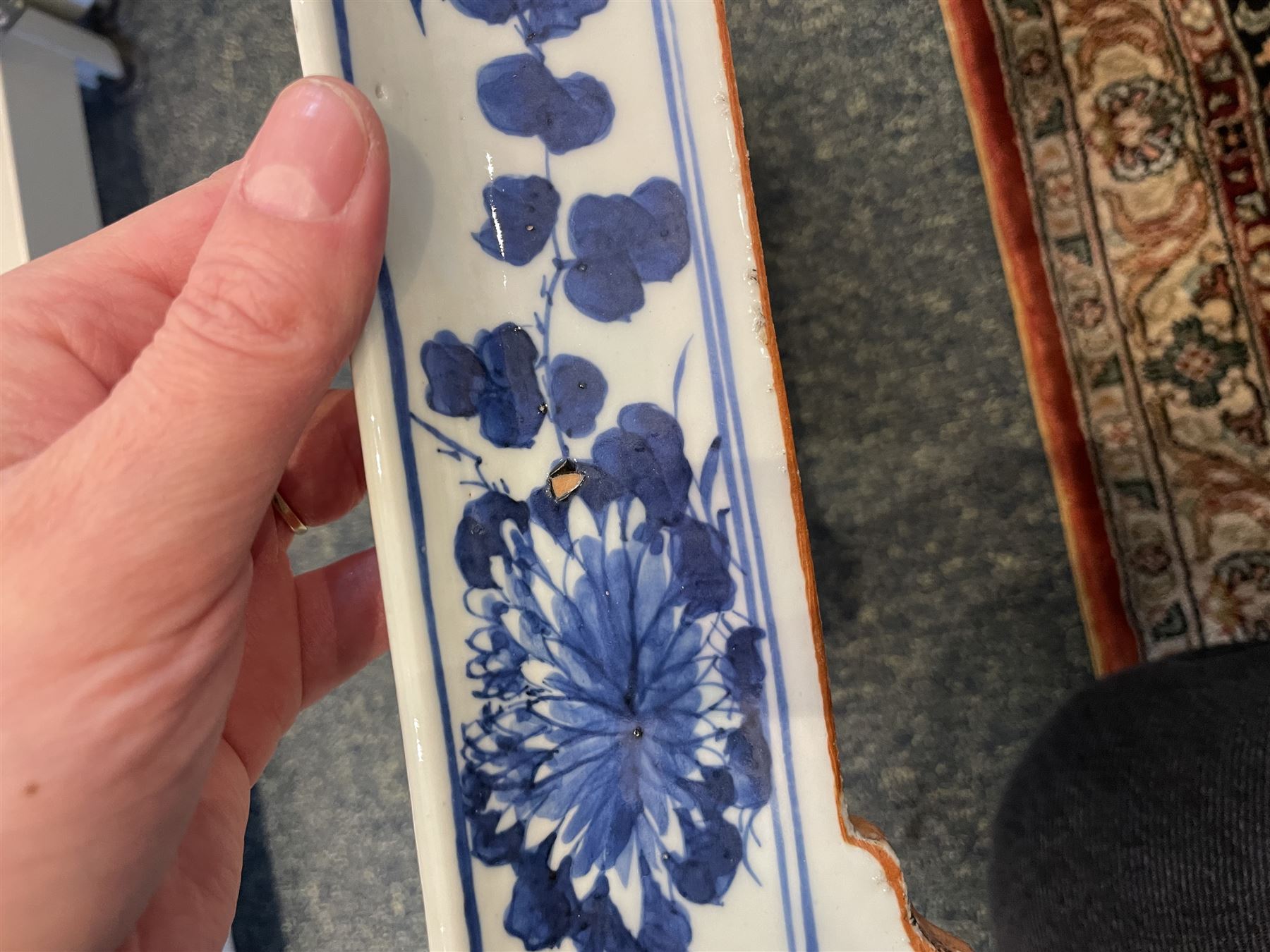 Chinese blue and white planter and stand, each of square slightly tapering and flared form, the planter decorated with two dragons and blossoming peonies, between stylised borders, the stand decorated with flower heads and vines, planter H30cm W29cm, stand H7cm D28.5cm