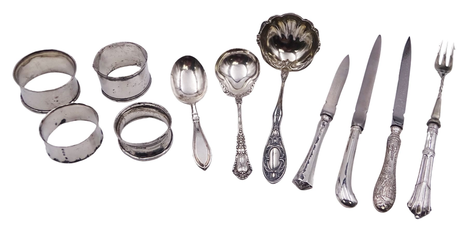 Group of silver, comprising modern silver handled letter opener, the handle decorated in low relief with Oriental scene set with pagodas, bridge and boat, hallmarked Yates Brothers, Sheffield 2000, a 1920's silver handled letter opener, hallmarked Sheffield 1928, makers mark GB, and a further silver handled letter opener, hallmarks worn and indistinct, probably Edwardian, a 20th century sauce ladle, probably American, with part fluted bowl and foliate detail to terminal, marked Sterling, an American silver spoon marked Sterling and marked for Gorham,1930's caddy spoon, an Edwardian silver handled pickle spoon, and four napkin rings, various hallmarks, dates ranging 1906 to 1924, approximate total gross weight 8.19 ozt (254.8 grams)