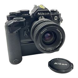 Nikon FM2n camera body, serial no. N8683100, with 'Nikon Zoom-NIKKOR 35-70mm 1:3.3-4.5' len, serial no. 2236565, Nikon MF-16 data back, serial no. 212905 and Nikon MD-12 Motor Drive, serial no 1570382 