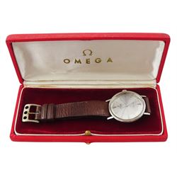 Omega Seamaster gentleman's stainless steel automatic wristwatch, silvered dial with baton and dagger hour markers, on brown leather strap, boxed
