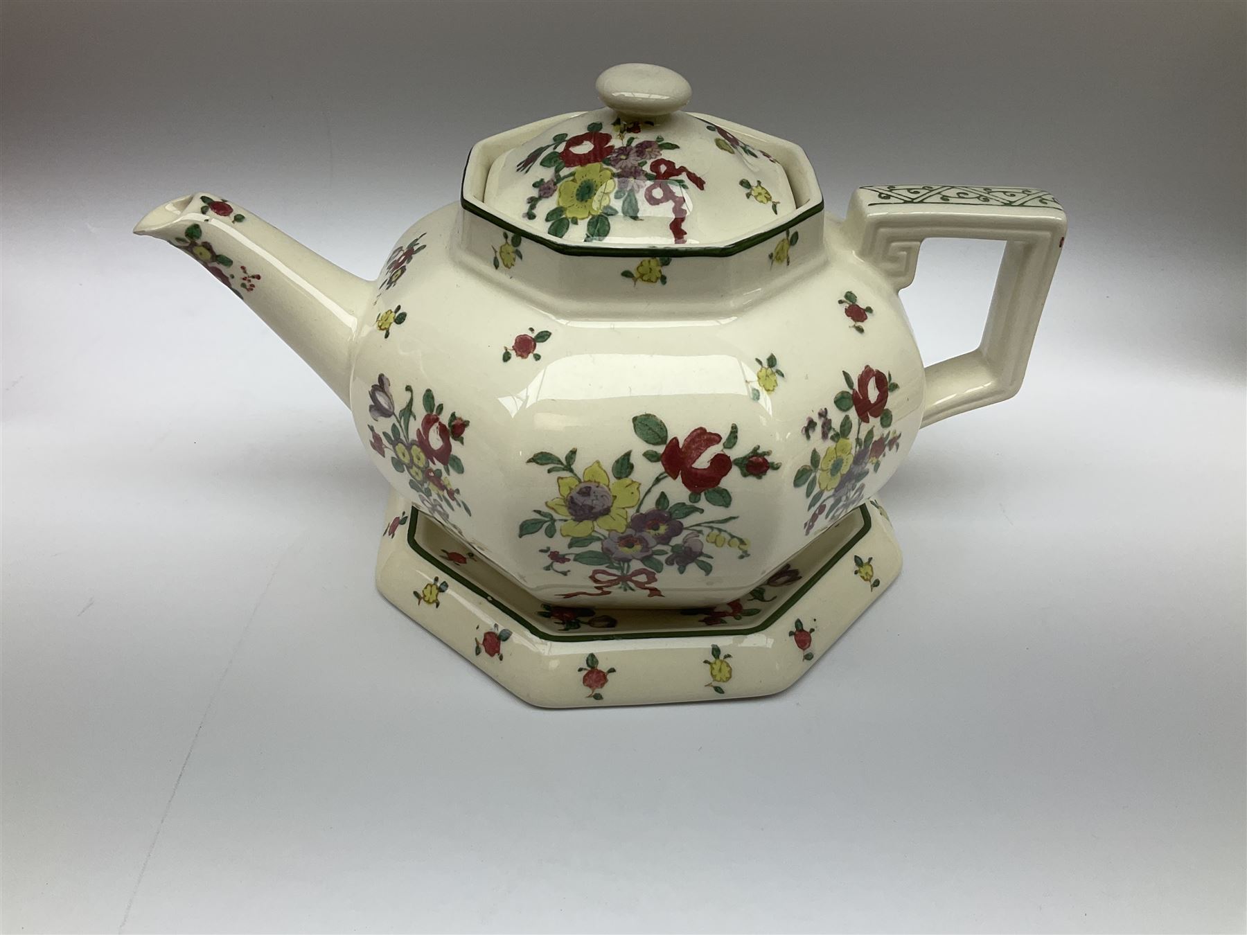 Royal Doulton part dinner service in Old Leeds Sprays pattern,  to include cheese dome, teapot and stand, egg cups etc, together with a selection of floral doilies.  