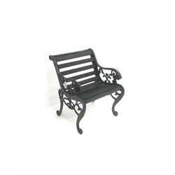 Cast iron framed garden chair with moulded rams head, timber slats