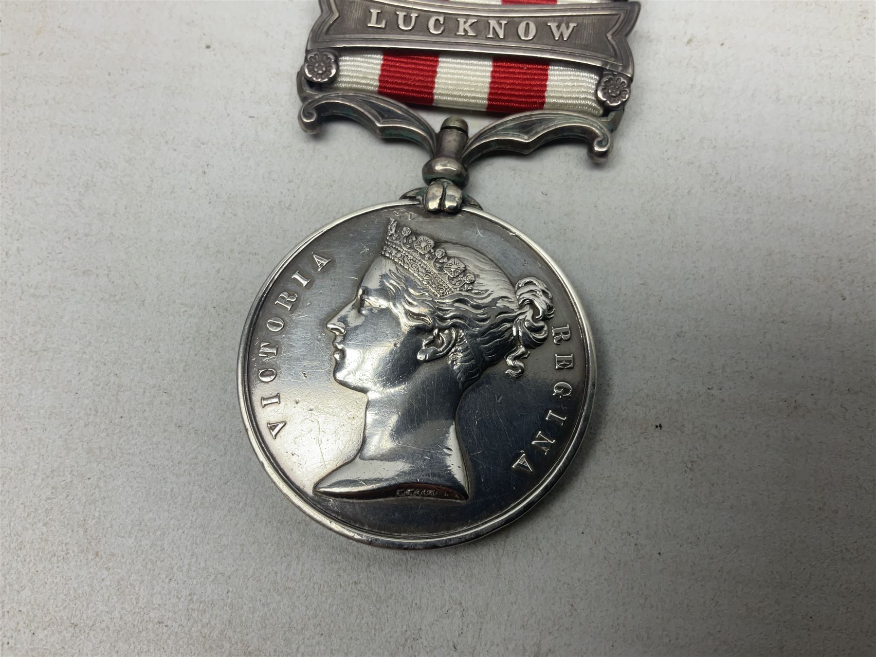 Victoria Indian Mutiny Medal with two clasps for Lucknow and Defence of Lucknow awarded to J. French 1st Batn. 5th Fusrs., with ribbon; some biographical details