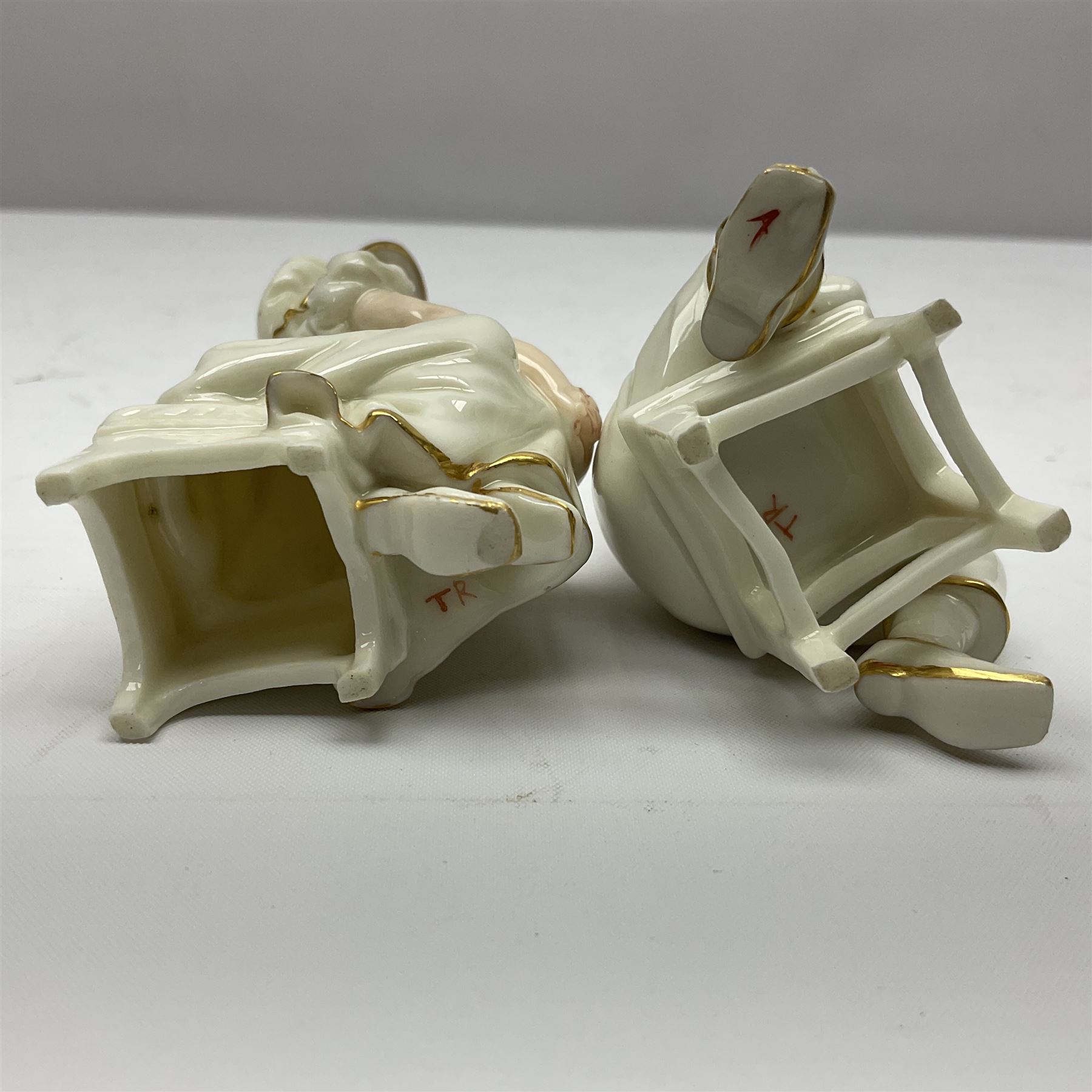 Royal Worcester tusk jug, blush ivory ground, with floral design, stamped 1116 to the base,, together with pair figures of a young boy and girl in the style on Kate Greenaway 