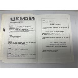 Hull F.C. memorabilia; Clive Sullivan 1986 memorial game programme, Open Evening 1994 programme with multiple player signatures, 'Old Faithful' 45rpm record, Wembley rosettes, 2000 team poster with facsimile signatures, framed print 'Farewell to the Boulevard 1895-2002', fully signed team photograph, various booklets, CD, DVD etc; and a folder containing the Merlin Rugby League card collection
