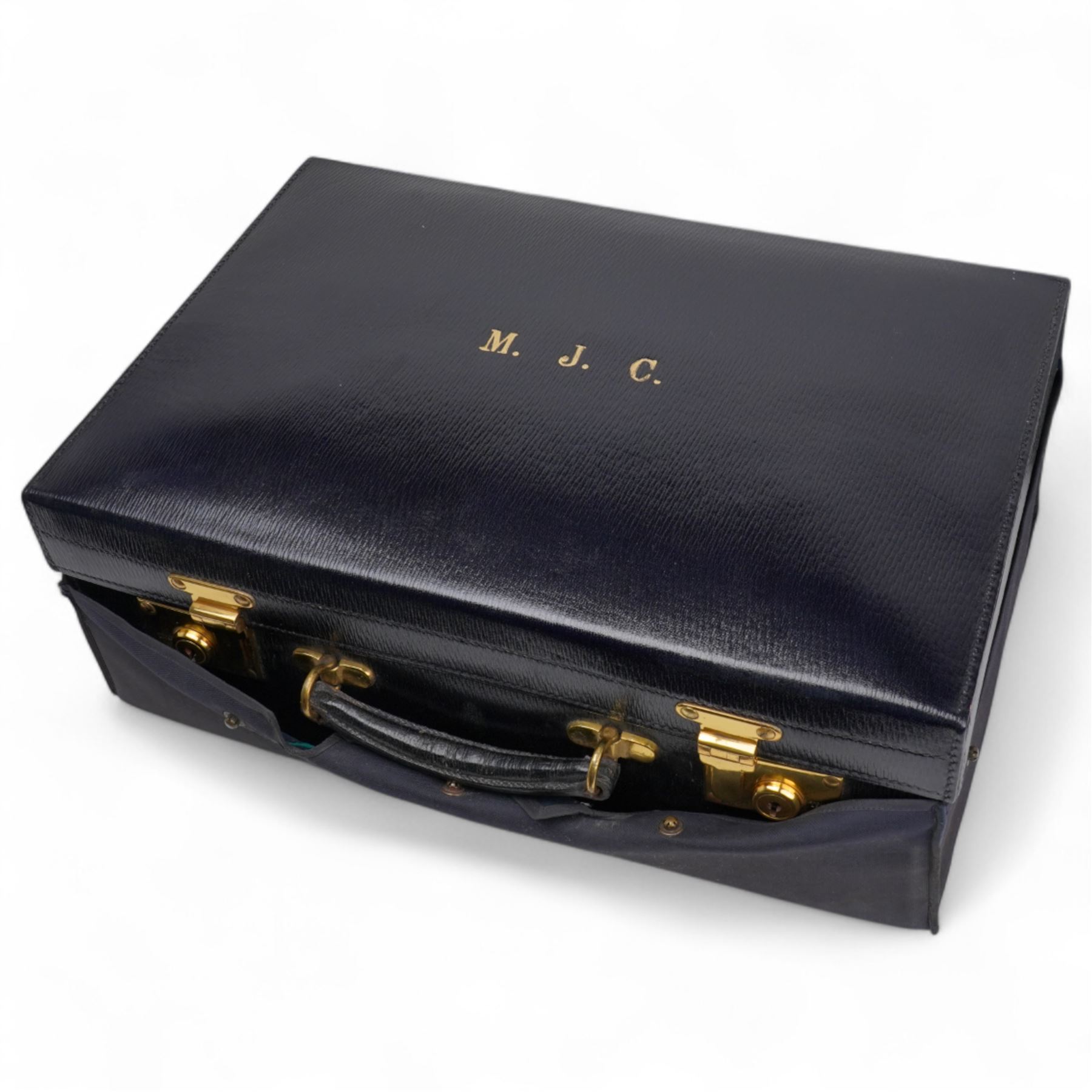 Early 20th century ladies leather travelling dressing case marked Walker & Hall, with watered silk interior and contents of silver mounted glass jars, dressing table set, leather blotter etc and with outer canvas London 1921/22 Maker Thomas Ingleton 46cm x 31cm 