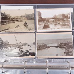 Two-hundred and thirty eight early 19th century to 20th century Whitby view postcards, including twenty-four early 19th century court cards, seventeen views of Whitby Abbey, forty depicting the fishing fleet and harbour, with a selection of cards providing a detailed study of the early 'Yards' the fisherman's dwellings around the harbour, all housed within a Stanley Gibbons Picture Postcard Album