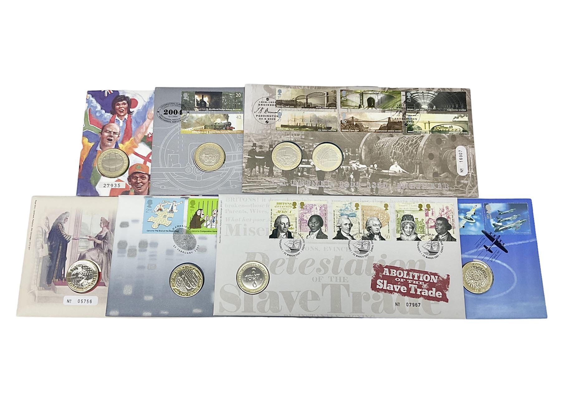 Seven The Royal Mint Royal Mail two pound coin covers, including 1999 'Rugby World Cup', 2003 'DNA Discoveries', 2004 'Classic Locomotives', 2007 '300th Anniversary of the Act of Union' etc