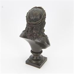 After Jean Bulio (French 1827-1911): bronze bust, modelled as Christ wearing crown of thorns, upon a socle base and square plinth, signed Bulio verso, overall H28.5cm
