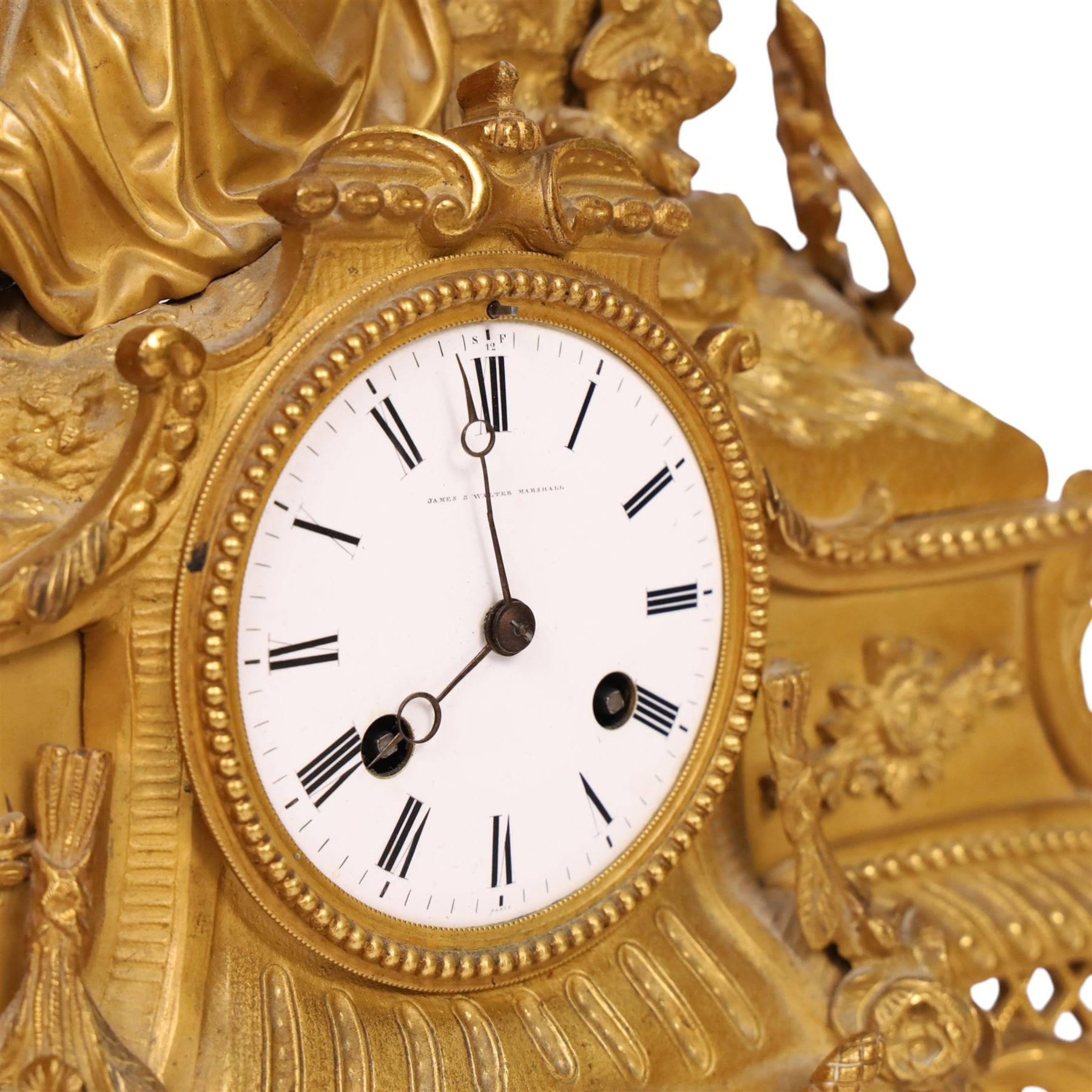 19th century French ormolu mantel clock, retailed by J & W Marshall, Paris, surmounted with a figure of in neo classical dress, with enamelled Roman dial marked James & Walter Marshall, H39cm 