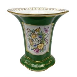 Dresden vase of tapering form, painted with a central reserve of blooming flowers surrounded by gilt border and green ground decorated with gilt leafy scrolls, upon splaying foot, with mark beneath, H18.5cm
