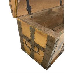 19th century painted oak sea chest, hinged dome top enclosing small compartment, bound by shaped and pressed metal strapwork, scumbled finish to resemble oak and painted with small vignettes depicting portraits and landscapes within panels, fitted with large wrought metal carrying handles, the front inscribed 'H.J.S. 1870' 