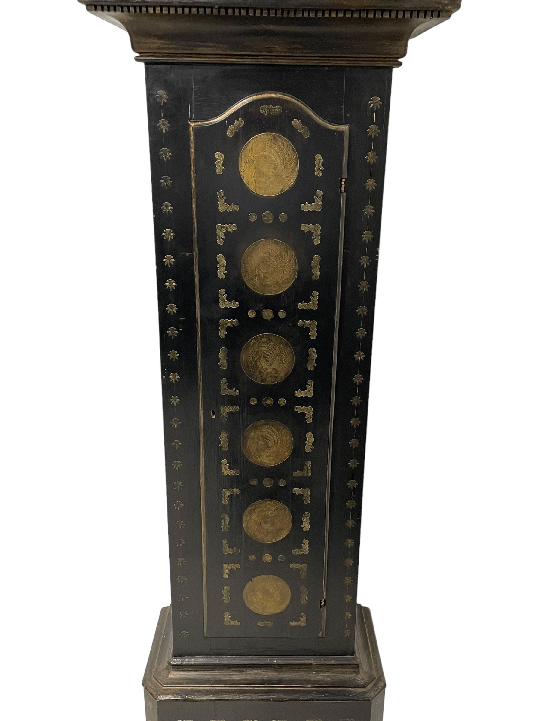 James Bowra of Sevenoaks Kent - 18th century 8-day ebonised longcase clock with gilt decoration c1740, with a flat top, dentil moulding beneath and shaped back splats, break arch hood door flanked by plain pilasters with wooden capitals, long trunk with a curved topped door, on a square plinth with canted corners and raised on a moulded base, brass dial with cast spandrels and a silvered 'Punch' automata to the arch, matted dial centre with seconds ring and date aperture, silvered chapter ring with Roman numerals, five minute Arabics, minute and quarter hour tracks, with matching steel hands and silvered makers name plate, rack striking movement with a recoil anchor escapement, striking the hours on a bell. With weights and pendulum.