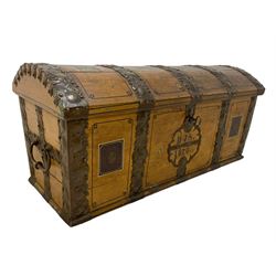 19th century painted oak sea chest, hinged dome top enclosing small compartment, bound by shaped and pressed metal strapwork, scumbled finish to resemble oak and painted with small vignettes depicting portraits and landscapes within panels, fitted with large wrought metal carrying handles, the front inscribed 'H.J.S. 1870' 