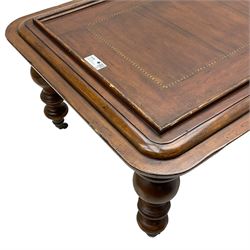 Milling Road - cherry wood coffee table, rectangular top with rounded corners, on turned feet with castors