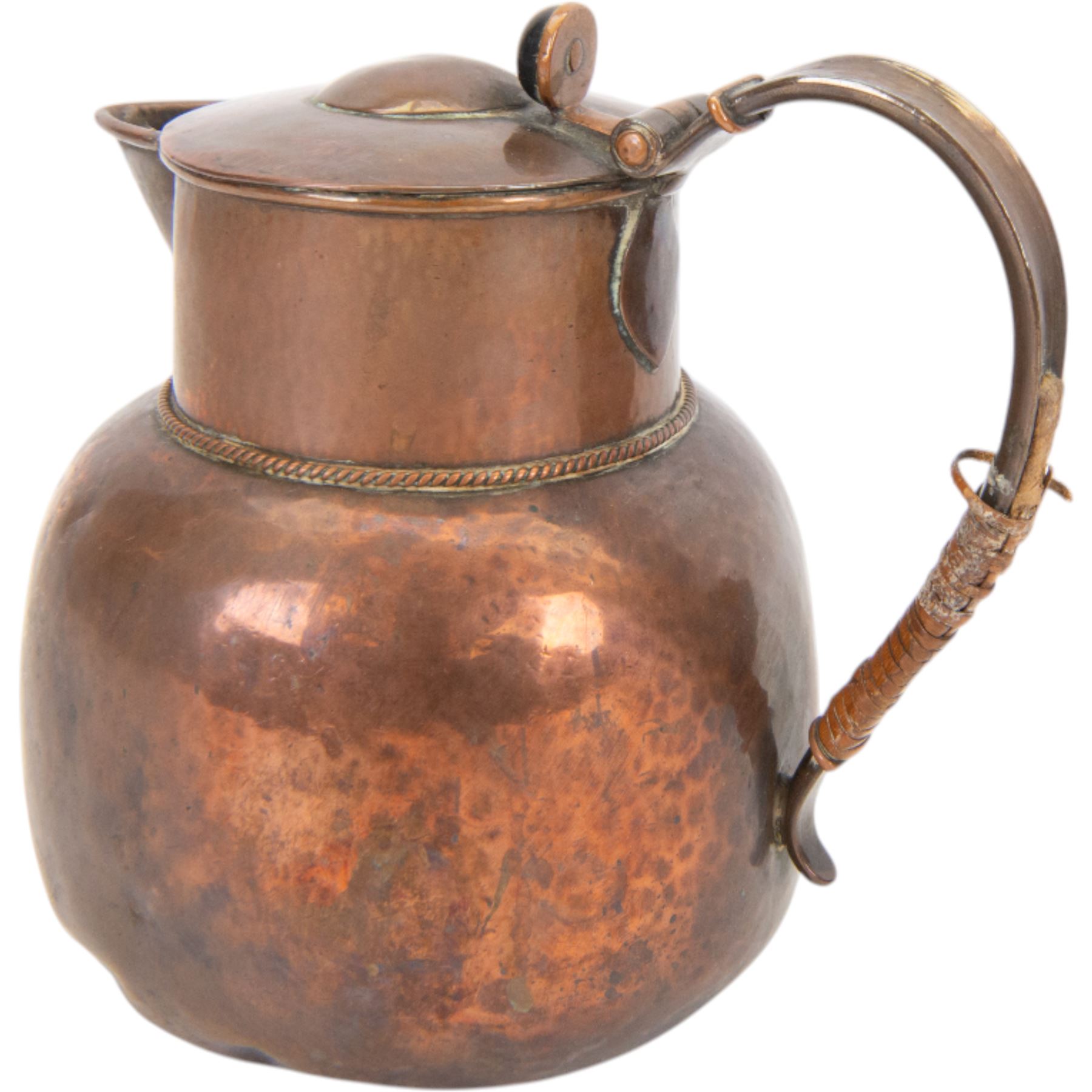Keswick School of Industrial Arts: Arts & Crafts copper teapot, of stylised squat form with cane bound reed handle and ebony finial, together with a lidded jug, of bellied form with cane bound handle and Bakelite type thumbpiece and a cream jug of squat form with stylised loop handle, all stamped KSIA beneath, tallest H14cm