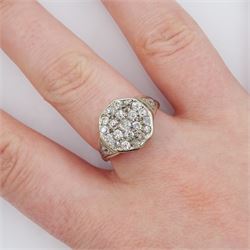 Early 20th century 18ct white gold and silver old cut diamond cluster ring, with diamond set shoulders, total diamond weight approx 0.90 carat