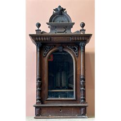 Victorian Penny-in-the-slot Polyphone, the walnut case with arched pediment and applied cartouche above pierced fretwork spandrels, glazed door above drawer to base, retailers label to each side reading 'H.Peters & Co. London Made in Leipzig' enclosing a fully working mechanism complete with 11 disks (50cm diameter) and winding handle.   - COLLECTION BY APPOINTMENT FROM: The White House, Thirsk Road, Easingwold, York, YO61 3NF - CALL 01723 507111 TO ARRANGE