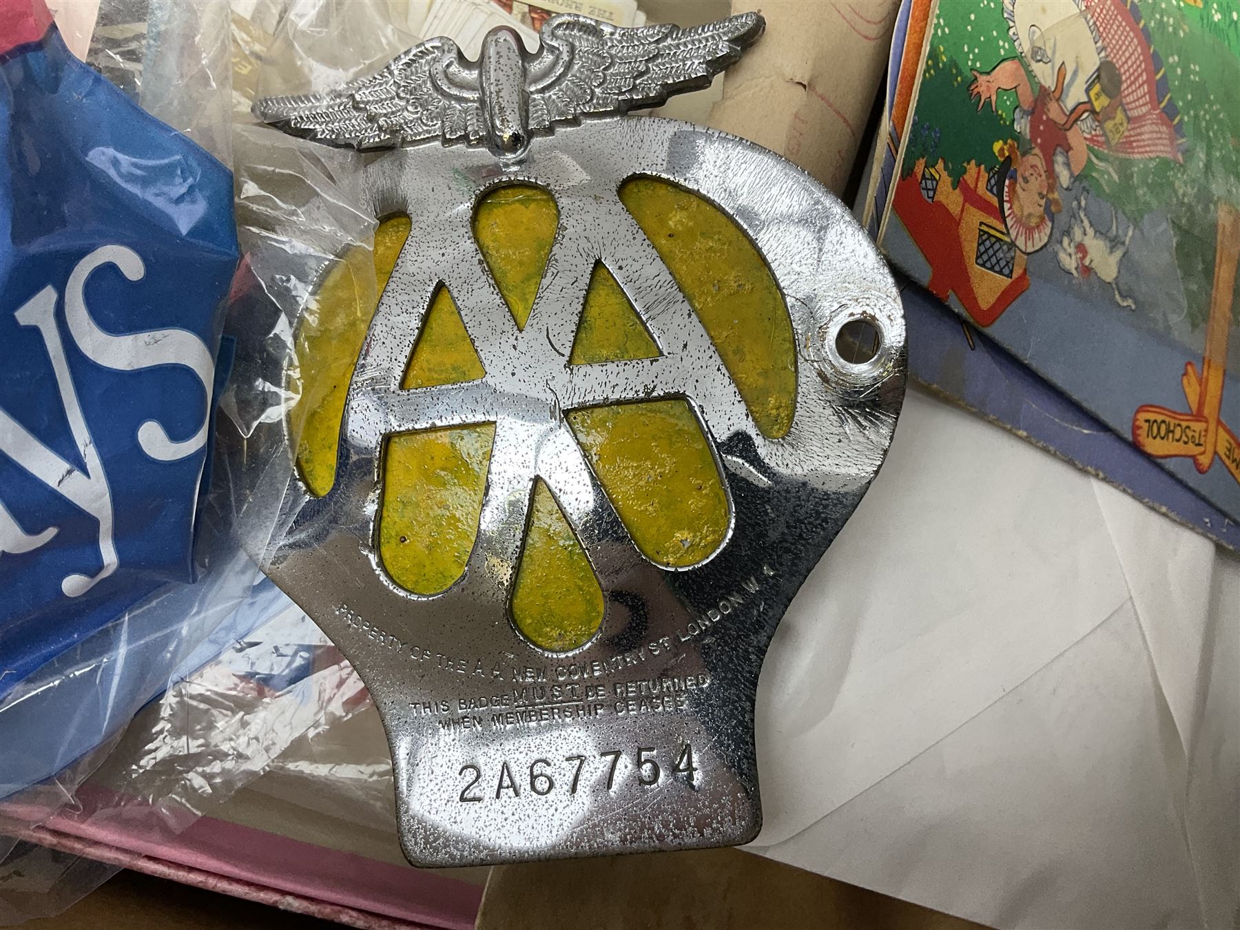 Chrome AA Members Badge, No 2A67754, together with two Raphael Tuck & Sons Christmas cards, cigarette cards, postcards and other ephemera 