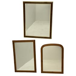 Large rectangular bevelled mirror in walnut finish frame (89cm x 115cm), arched polished pine mirror, and a rectangular polished pine mirror