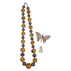18ct gold spiral pendant, silver butterfly brooch and a beaded necklace
