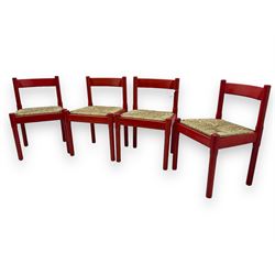 Vico Magistretti - mid-20th century circa. 1970s set of four beech framed dining chairs in red finish, with drop-in rush seats
