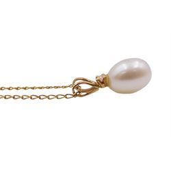 Gold single stone pearl and diamond pendant, stamped 14K, on 9ct gold necklace