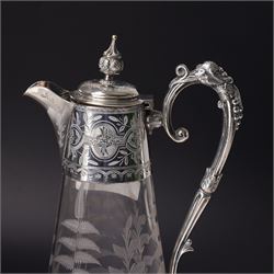 Victorian opaque glass ewer with clear cut decoration and clear glass handle H28cm and an etched glass claret jug with silver plated cover and handle H31cm
