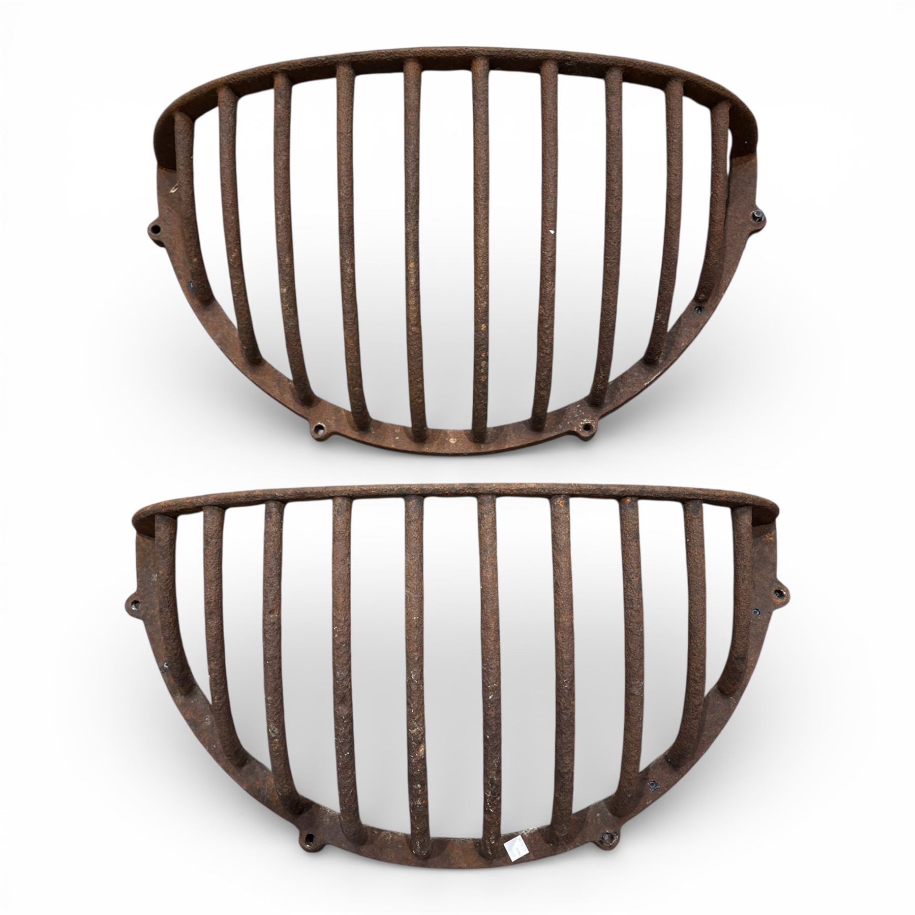 Pair of large 19th century cast iron hay racks