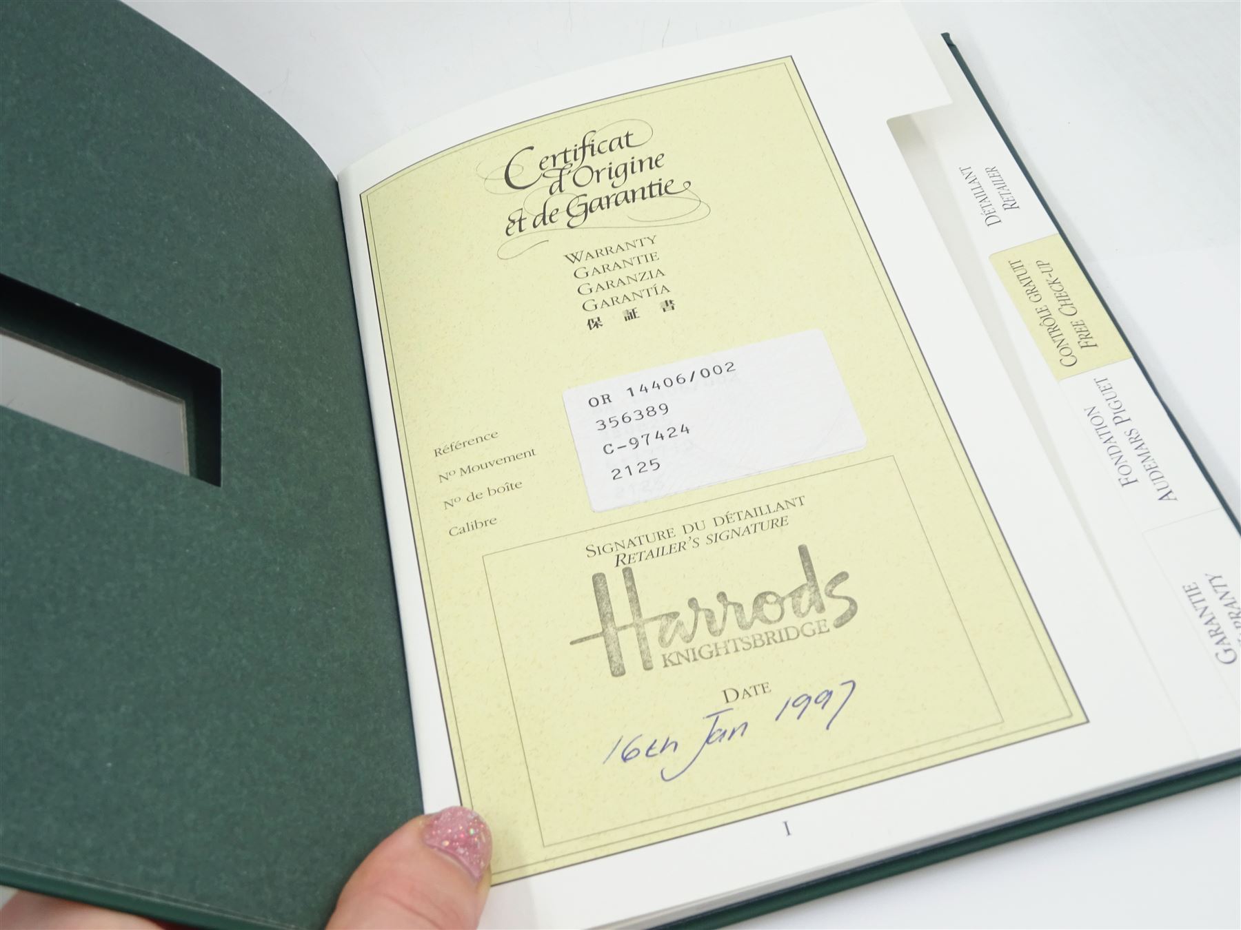 Audemars Piguet gentleman's 18ct gold automatic wristwatch, Ref. 14406 / 002, Cal. 2125, white dial with Roman numeral hour markers and date aperture, on brown leather strap, with original certificate, purchased through Harrods and dated 1997 