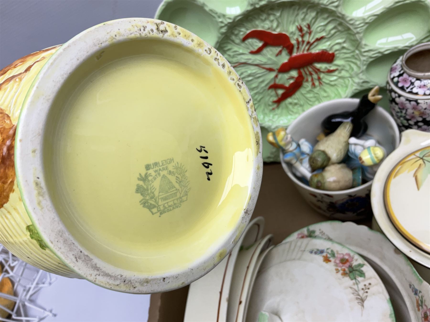 Burleigh Ware jug of baluster form modelled with fox and heron, cabbage dish, Carlton Ware lobster scallop dish, Royal Doulton The Hunting Man plate, Grimwades, other early 20th century ceramics and a Henry Alcock wash set to include jug and bowl, chamber pot etc