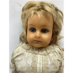 Early 20th century Cuno and Otto Dressel wax shoulder head doll with applied hair and fixed glass eyes, soft body with jointed composition lower limbs, maker's stamp to right thigh, clothing and box H38cm in original box