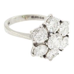 18ct white gold seven stone round brilliant cut diamond flower head cluster ring, London 1977, principal diamond approx 0.75, total diamond weight approx 3.15 carat