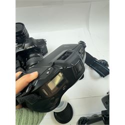 Six Minolta Dynax SLR camera bodies, comprising 800si serial no. 62703606, three 7xi examples, including one boxed example, serial nos. 20106944, 16123311 & 22107553, and two 9xi examples, serial no. 18209901 & 18202113, with three Minolta lenses, including Zoom xi 28-105mm 1:3.5(22)-4.5 lens, AF Zoom 28-85mm 1:3.5 (22)-4.5 lens and an AF Zoom 75-300mm 1:4.5(32)-5.6 lens, Hama carry case and other accessories