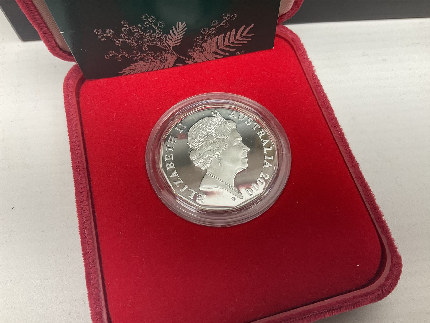 Single owner lifetime collection of mostly commemorative modern World coins with gold, silver and base metal examples, including two Queen Elizabeth II Bailiwick of Guernsey twenty-five pound gold coins 'The 1999 Royal Wedding' and '100th Anniversary of the End of the Victorian Era' 2001 each in 24 carat gold weighing 7.81 grams with certificates, silver coins commemorating the Millennium 2000 including Guyana sterling silver proof two-thousand dollars, Fiji sterling silver proof five dollars etc, silver coins from the Queen Elizabeth II Golden Jubilee Collection dated either 2002 or 2003 from Great Britain and the Commonwealth countries, United Kingdom commemorative crowns in card folders, The Royal Mint United Kingdom 1997 proof coin set in red folder without certificate etc