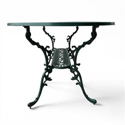 Cast aluminium oval garden table and set of four armchairs with pierced rose design back splats