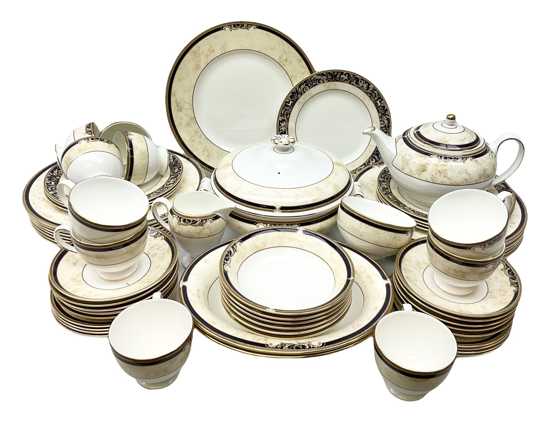 Wedgwood cornucopia pattern tea and dinner service, comprising teapot, ten cups and saucers, milk jug, open sucrier, eight dessert plates, fourteen dinner plates, eight side plates, six bowls, two open serving dishes and one covered twin handled dish (53)
