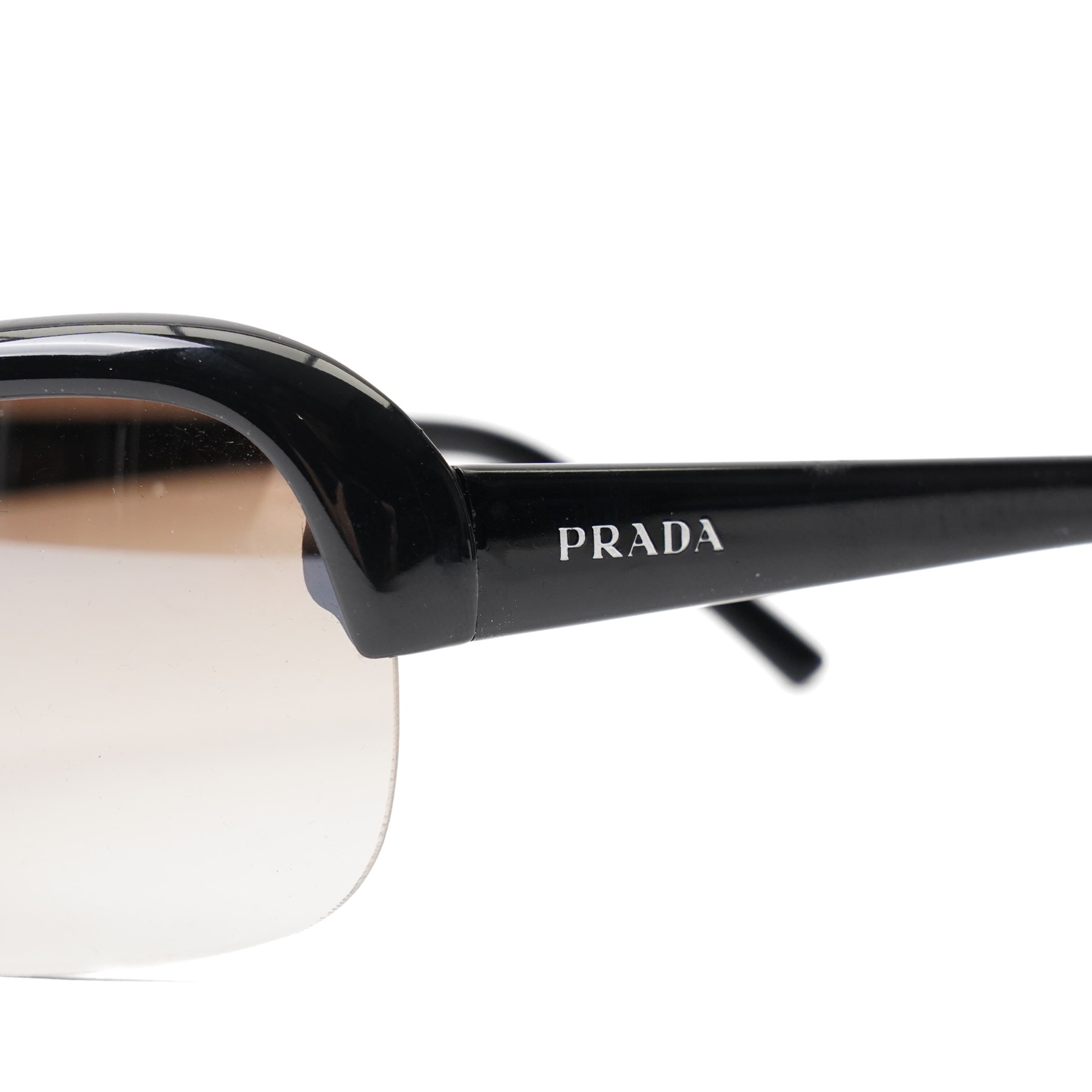 Prada - half-rim shield-style sunglasses in black acetate, with graduated smoke lenses and silver-tone PRADA lettering to the temples, in original hard case