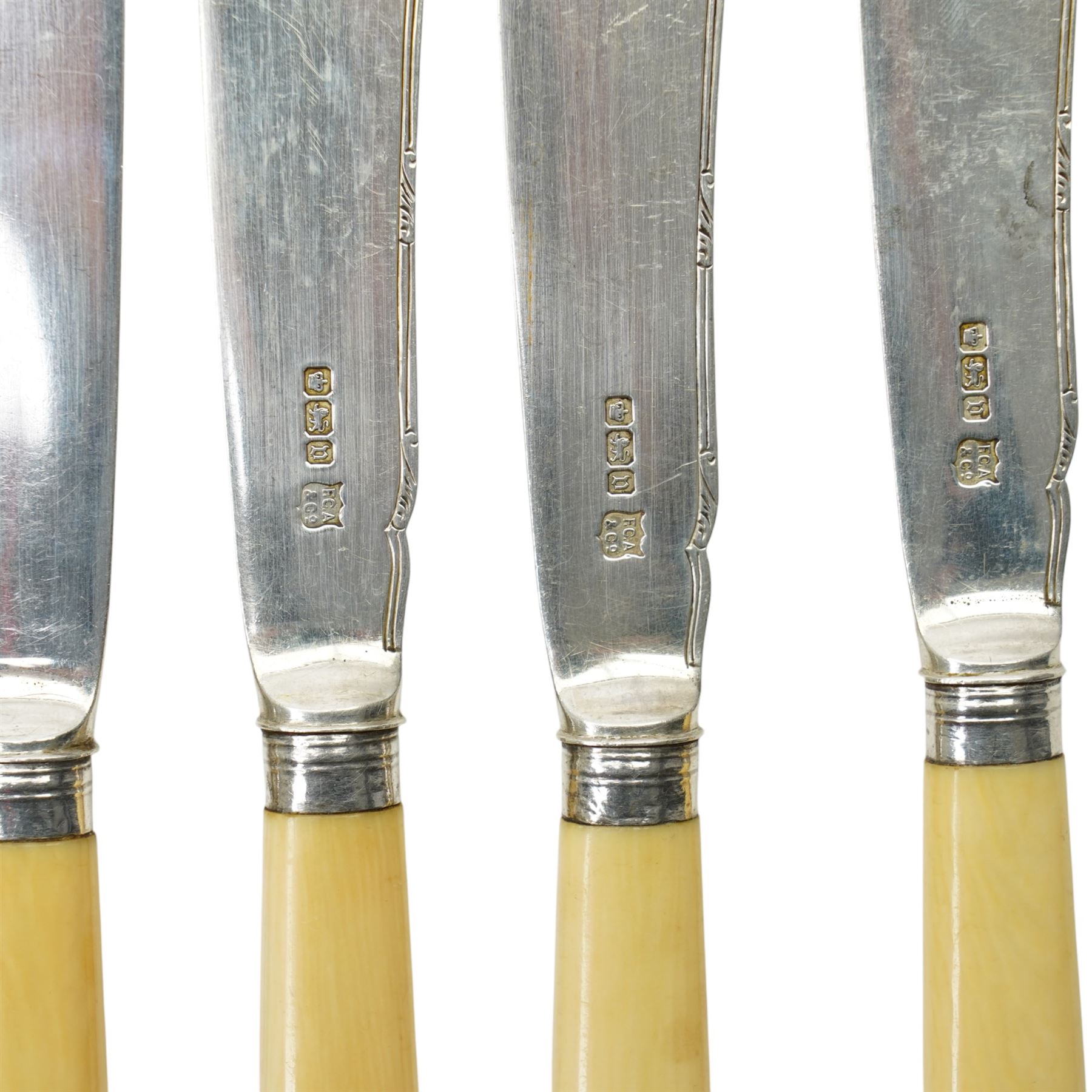 Collection of silver fish knives and forks