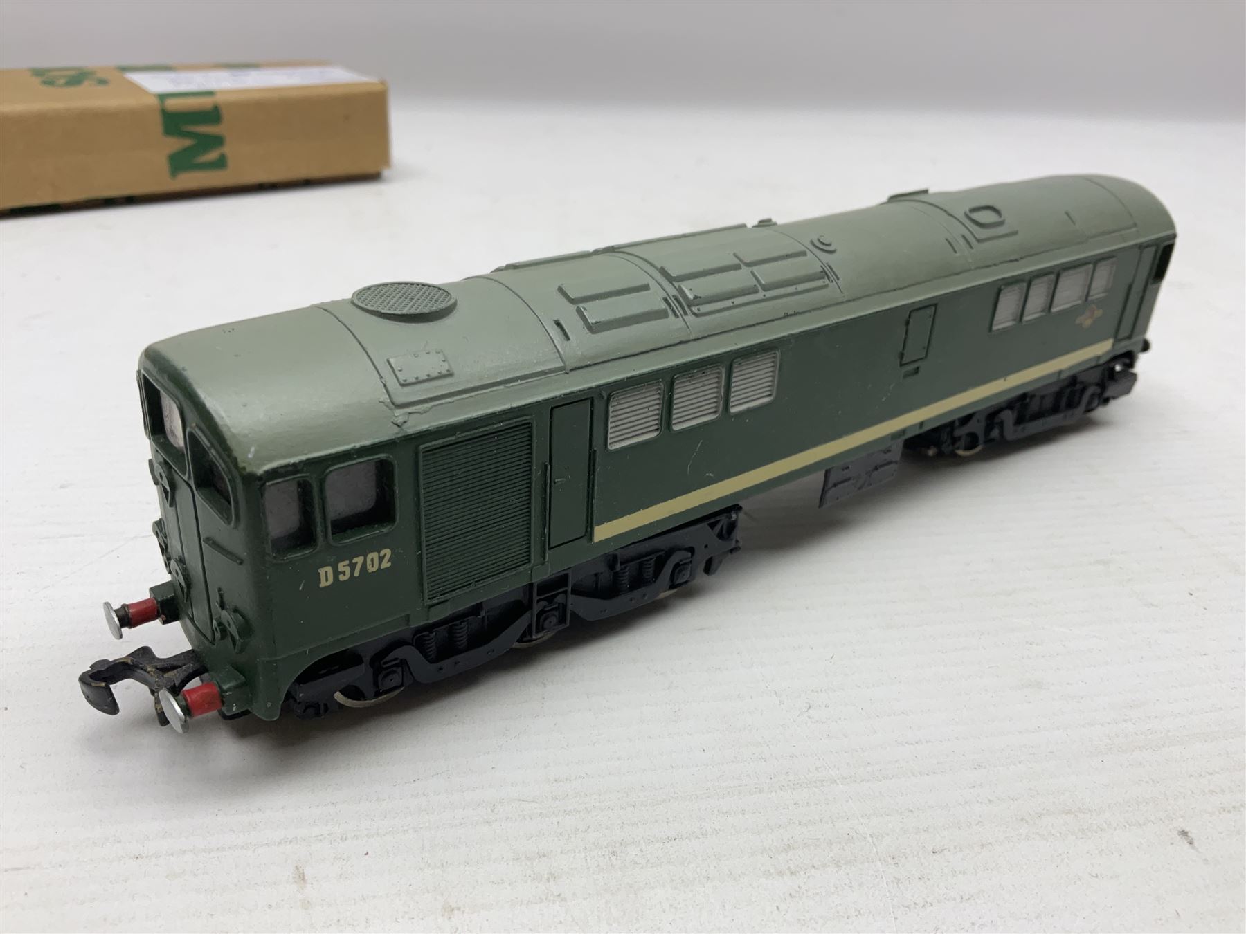 Hornby Dublo - 2-rail - Class 8F 2-8-0 locomotive No.48109 in BR black; Class R1 0-6-0 tank locomotive No.31337 in BR black; and Met-Vic Diesel Co-Bo locomotive No.D5702 in BR green; together with 3-rail Class 4MT Standard Tank 2-6-4 locomotive No.80054 in BR black; three unassociated boxes and one unboxed (4)