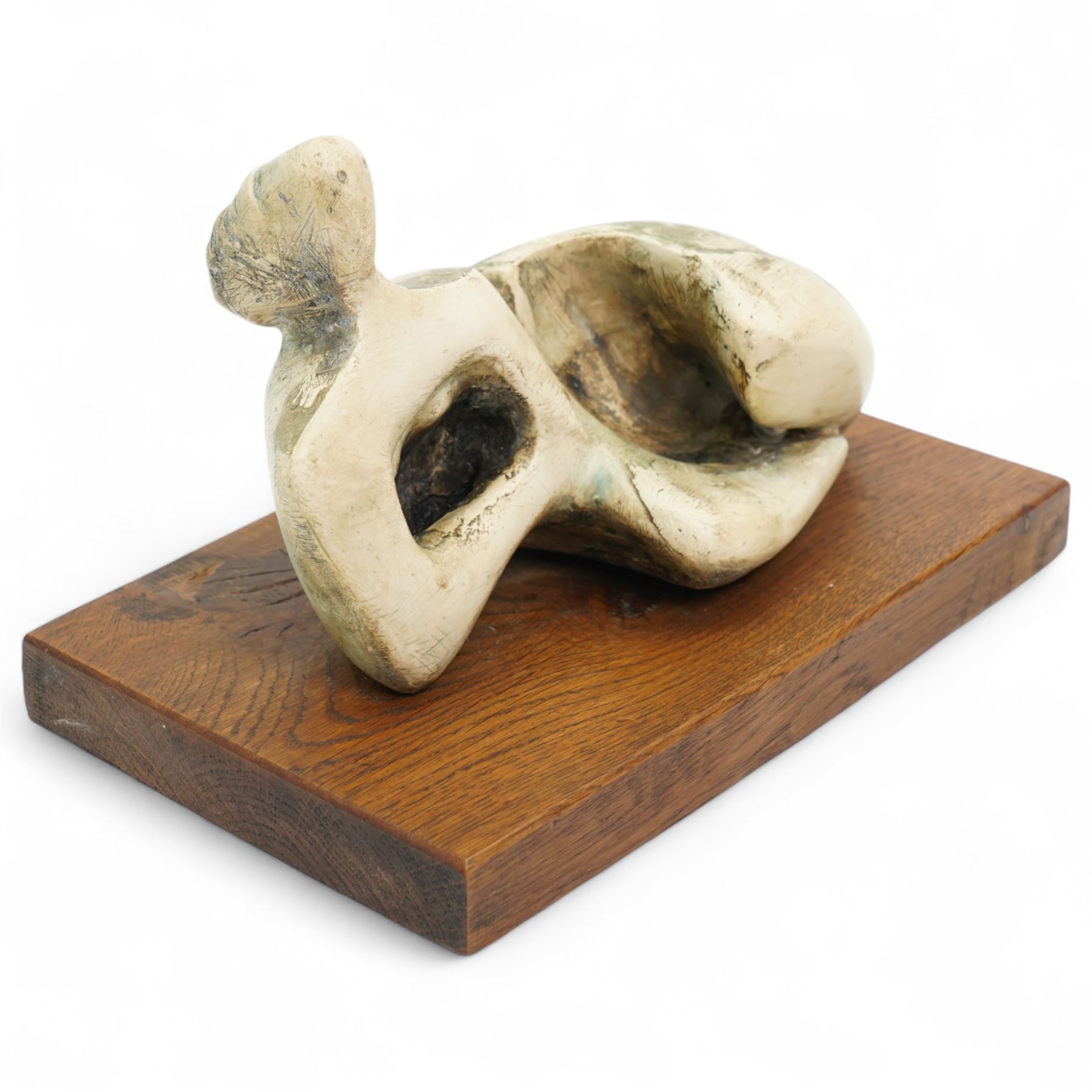 After Henry Moore (British 1898-1986): 'Reclining Figure Curved', terracotta maquette sculpture, base marked with affixed catalogue label inscribed 'Reclining Figure: Curved: 1976 Archive 0070930', W25cm H16cm