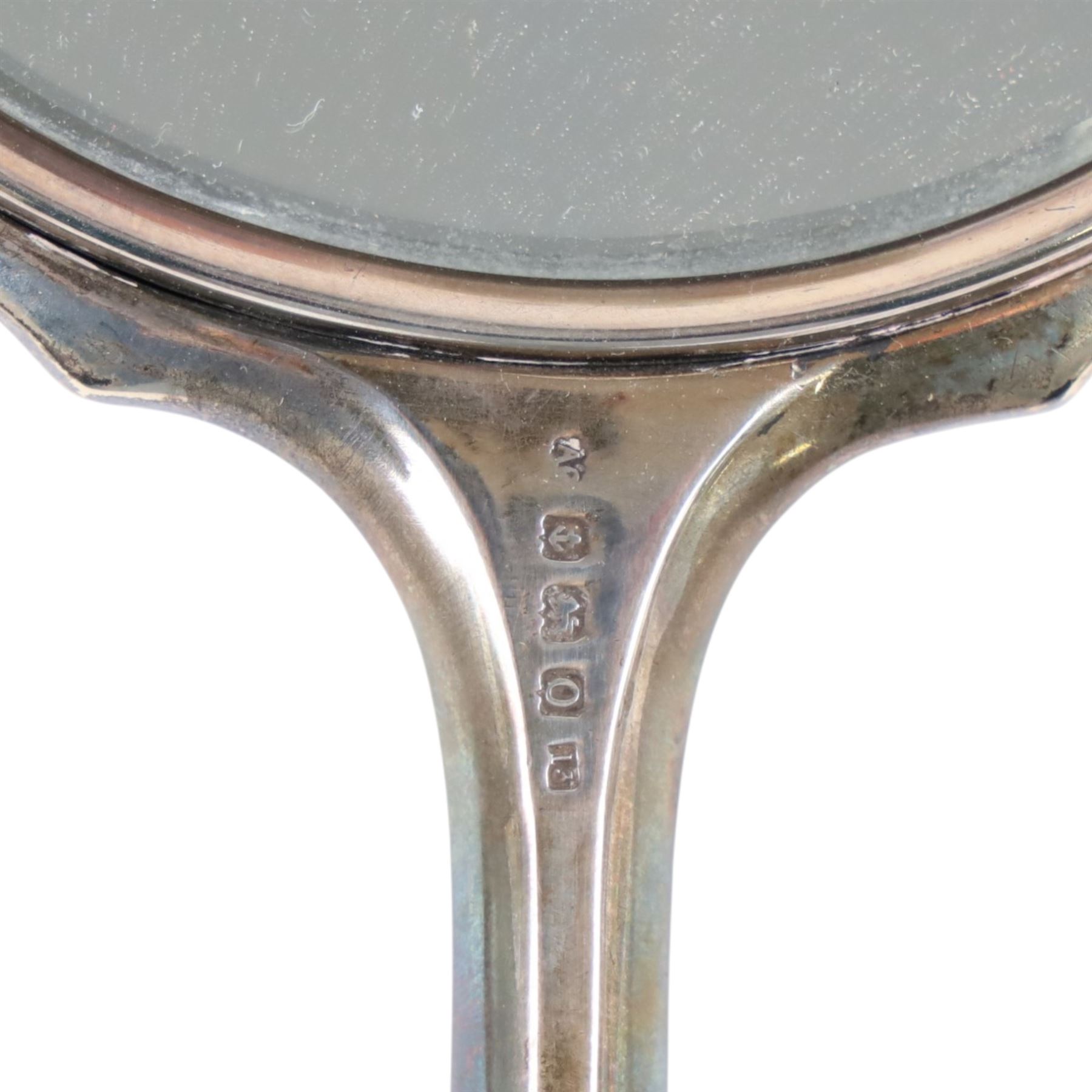 Silver mounted hand mirror, hallmarked together with silver mounted scent bottle and four other glass bottles