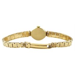 Avia ladies 9ct gold manual wind wristwatch, on integral 9ct gold bracelet, hallmarked