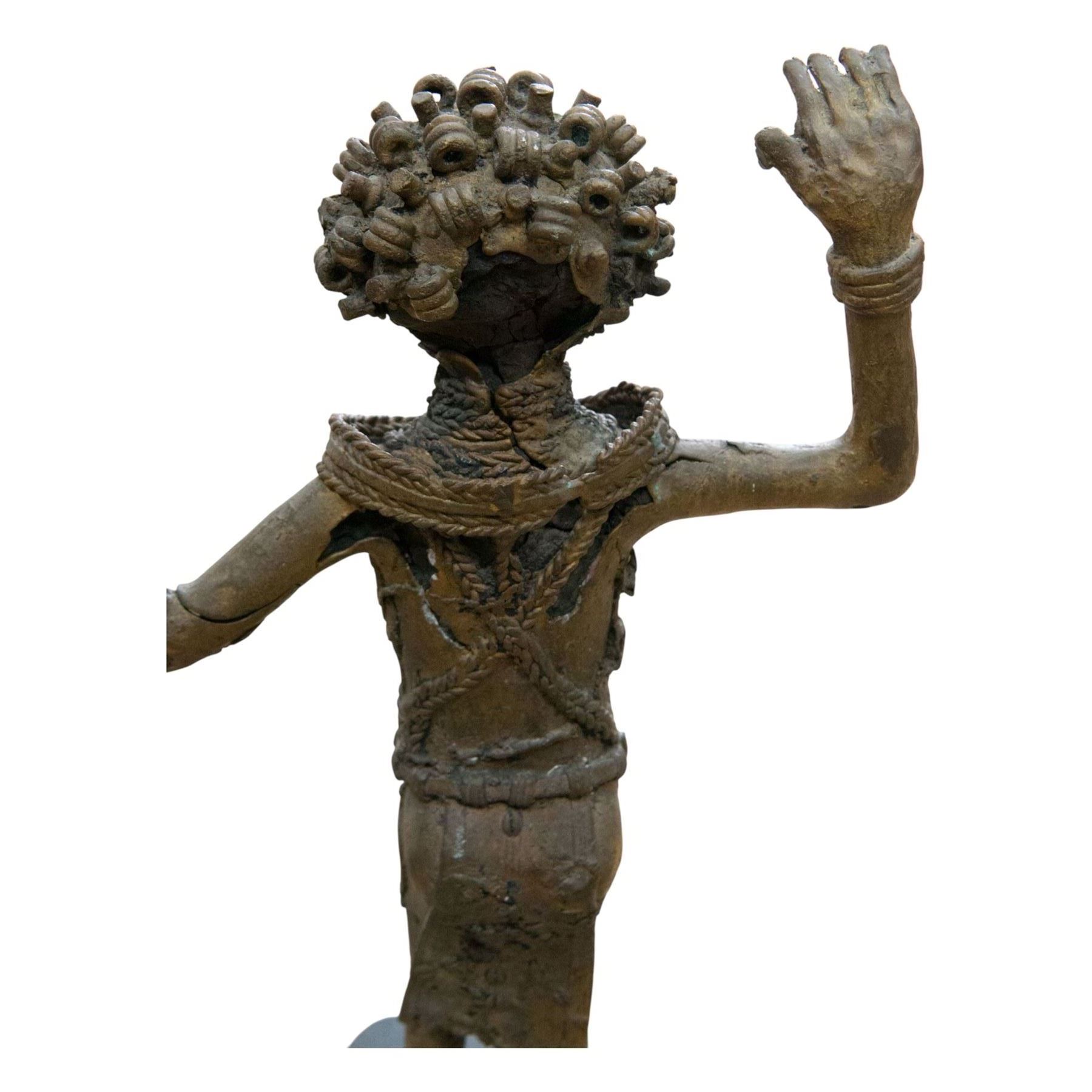 Pair of Benin bronze statures, modelled as a male and female, with armed raised, upon a square base, H76cm