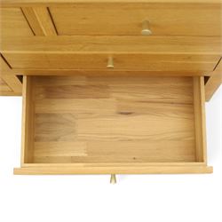 Contemporary light oak chest, rectangular top fitted with three short over four long drawers, on square feet