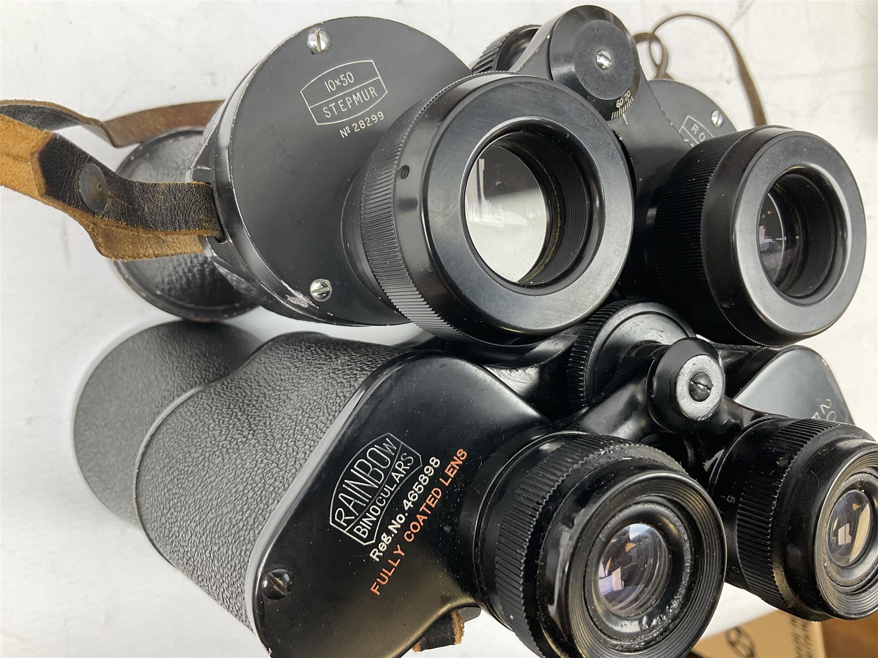 Ten cased pairs of binoculars, to include Rainbow 20x60, Barr & Stroud 7x, Yashica 7x50, Ross London Stepmur 10x50, Wray London Defiant 10x35, Canon 8x30 etc